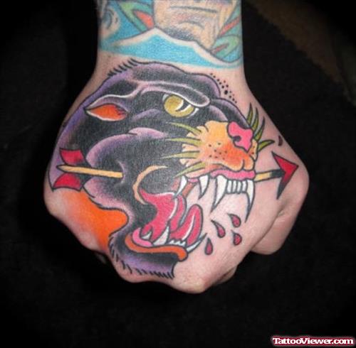 Colored Panther Head With Arrow Tattoo On Hand