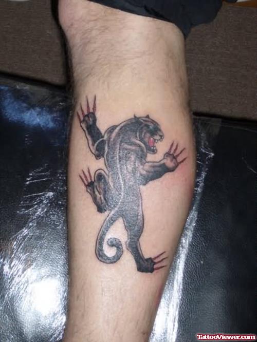 Black Panther Climbing On Leg Tattoo