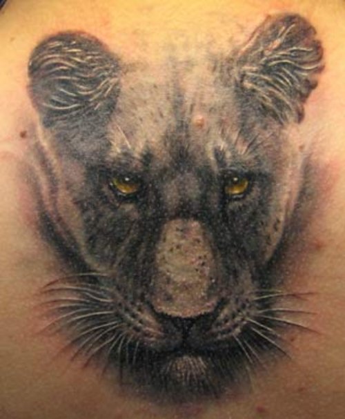 Grey Ink Panther Head Tattoo