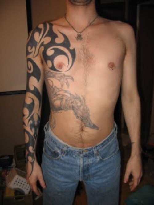 Tribal Tattoo On Sleeve and Panther Tattoo On Side Rib