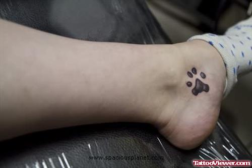 Paw Print Tattoo On Ankle