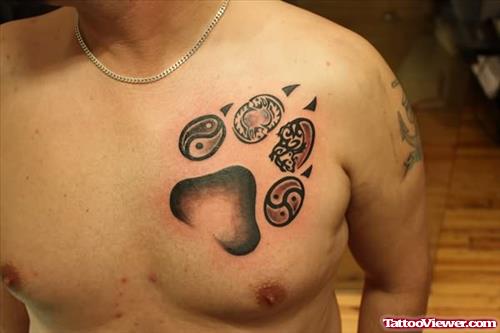 Black And Grey Paw Tattoo On Chest