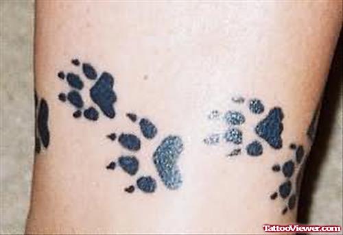 Wolf Paw Tracks Tattoo On Ankle