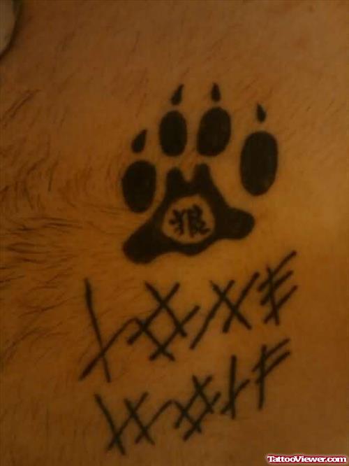 Symbols And Wolf Paw Tattoo