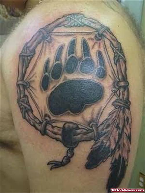 Bear Paw And Feather Tattoo