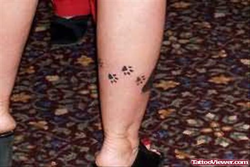 Paw Prints Tattoo On Leg