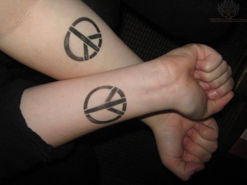 Black Ink Peace Tattoo On Wrists