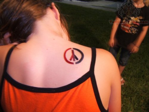 Black And Red Ink Peace Tattoo