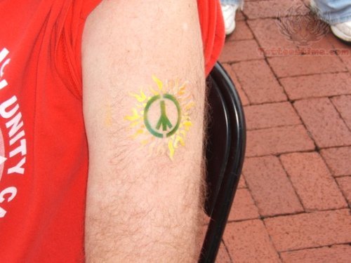 Green Peace Symbol Tattoo On Bicep