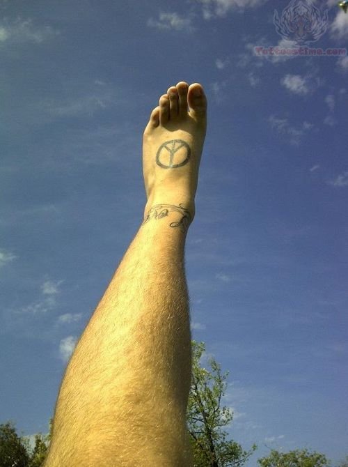 Peace Circle Tattoo On Foot