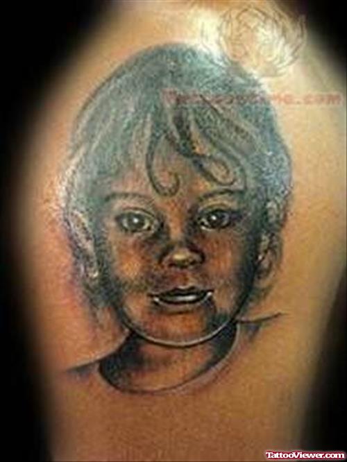 People Face Tattoo On Shoulder