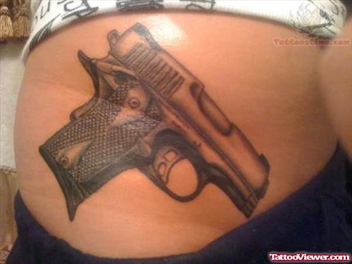 Pistol Tattoo On Waist