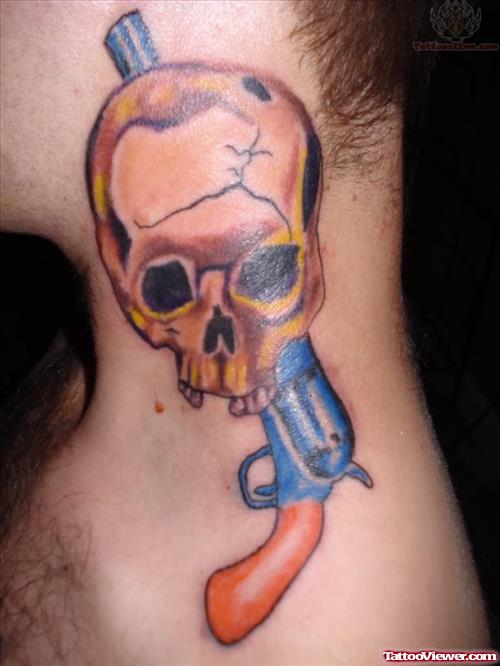 Skull With Pistol Tattoo