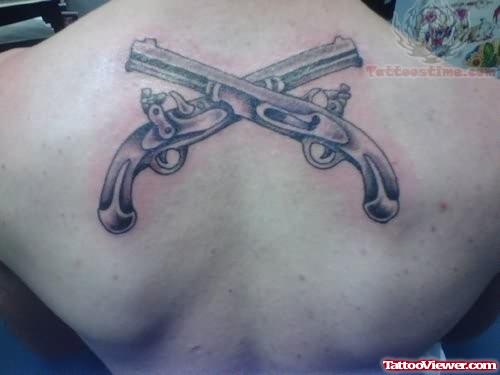 Upper Back Pistol Tattoos