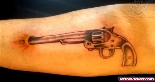 Shooting Pistol Tattoo on Arm