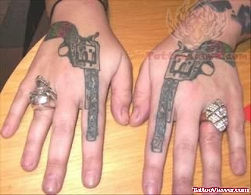 Pistol Tattoos On Hands