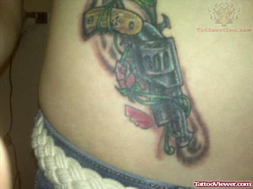 Pistol Tattoo On Side Rib