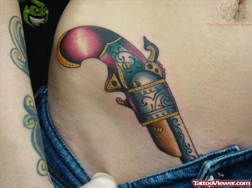Colorful Pistol Tattoo On Hip