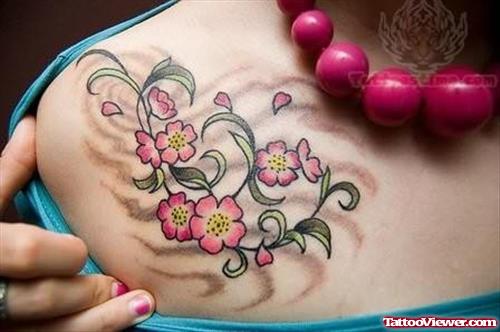 Flowers Plant Tattoo On Girl