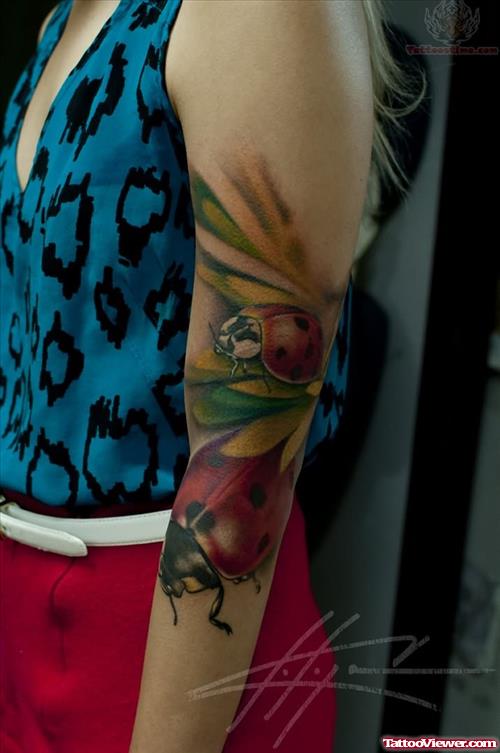 Ladybug And Plant Tattoo