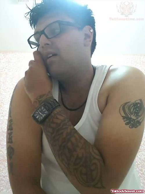 Khanda Tattoo On Left Biceps