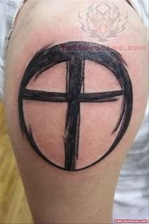 Black Ink Cross Tattoo On Shoulder