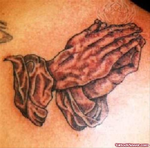 Praying Hands Tattoo On Back