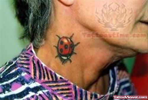Small Red Reptile Tattoo On Neck