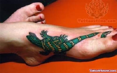 Green Reptile Tattoo On Foot