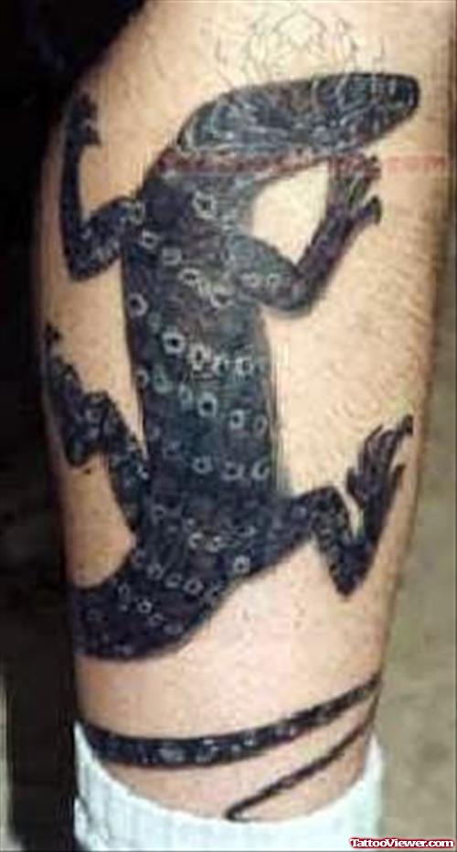 Greyish Reptile Tattoo On Leg