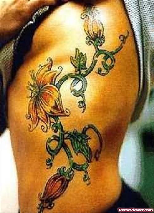 Lily Flowers Tattoo On Ribs