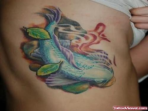 Fish Colourful Tattoo On Rib