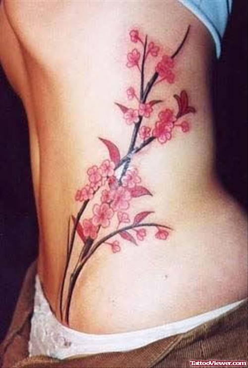 Flower Colourful Tattoo On Ribs