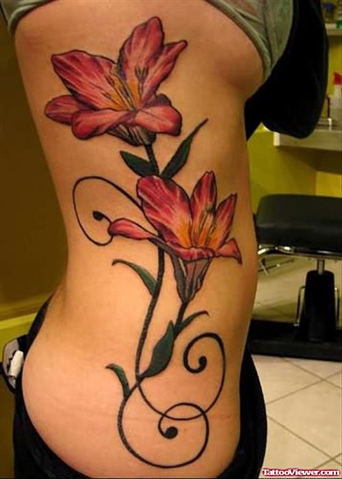 Amazing Coloured Flower Tattoo On Rib