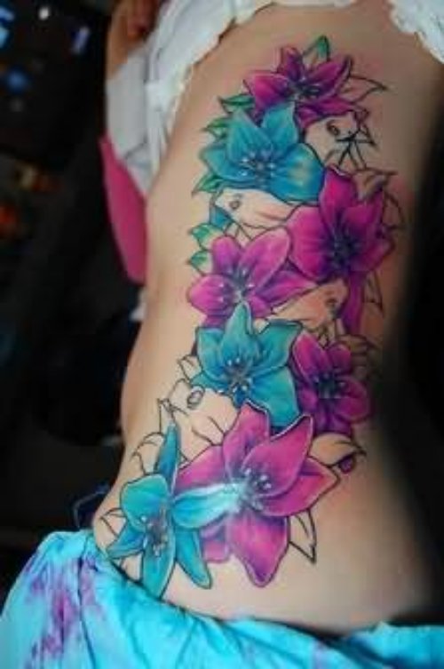 Lily Flowers Tattoo On Rib