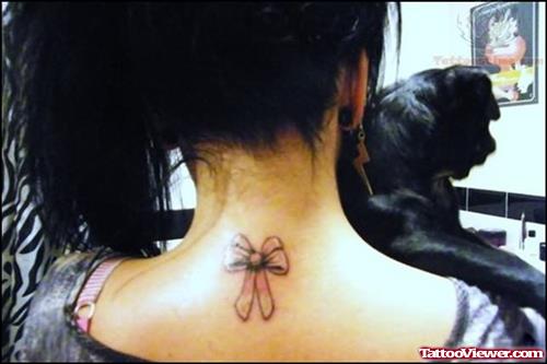 Bow Tattoo On Back Neck