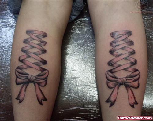 Ribbon Corset Tattoos On Legs
