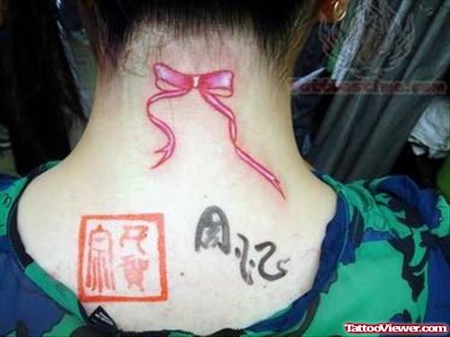 Ribbon Tattoo On Back Neck
