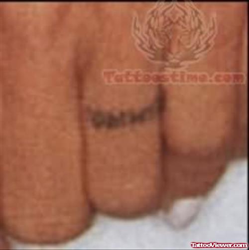 Pamela Anderson Ring Tattoo