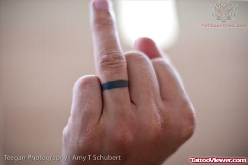 Black ink Ring Tattoo on Finger