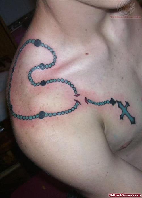 Rosary Tattoo On Upper Shoulder