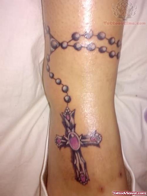Pink Rosary Tattoo On Leg