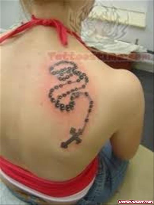 Rosary Tattoo on Girl Back