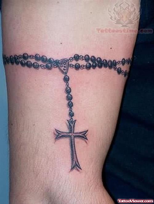 Rosary Tattoo On Bicep