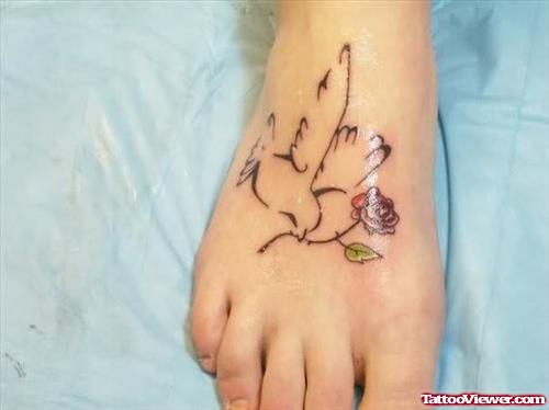 Dove With a Rose Tattoo On Foot
