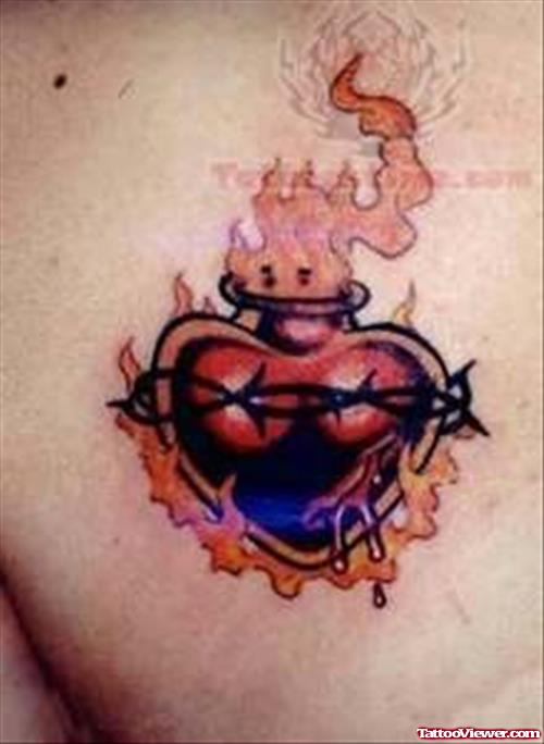 Burning Sacred Heart Tattoo On Backpiece