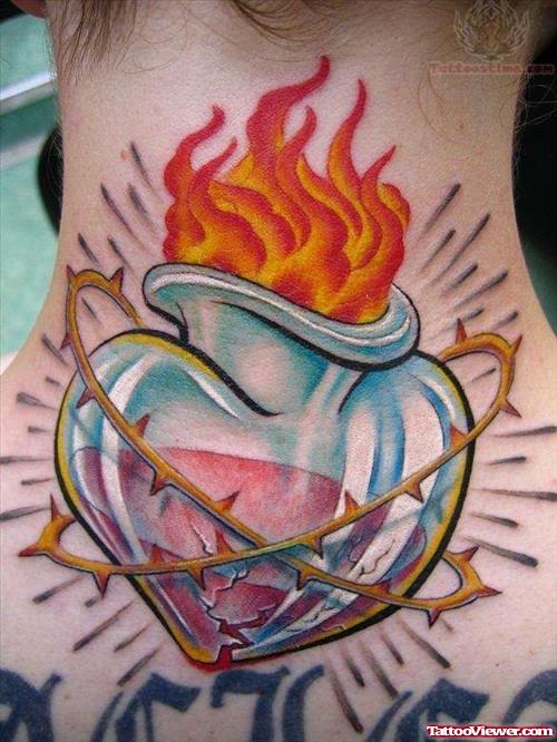 Burning Sacred Heart Tattoo On Back Neck