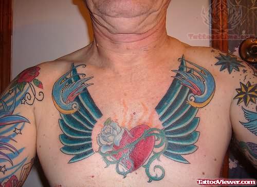 Winged Sacred Heart Tattoo On Chest
