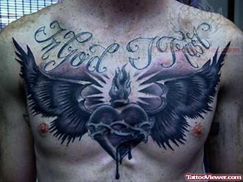 Black ink Sacred Heart Tattoo On Chest