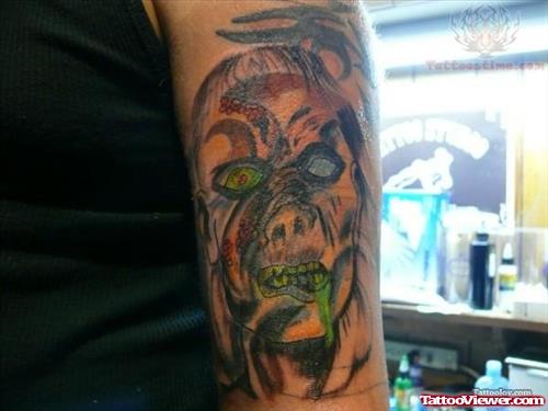 Scary Face Tattoo On Arm